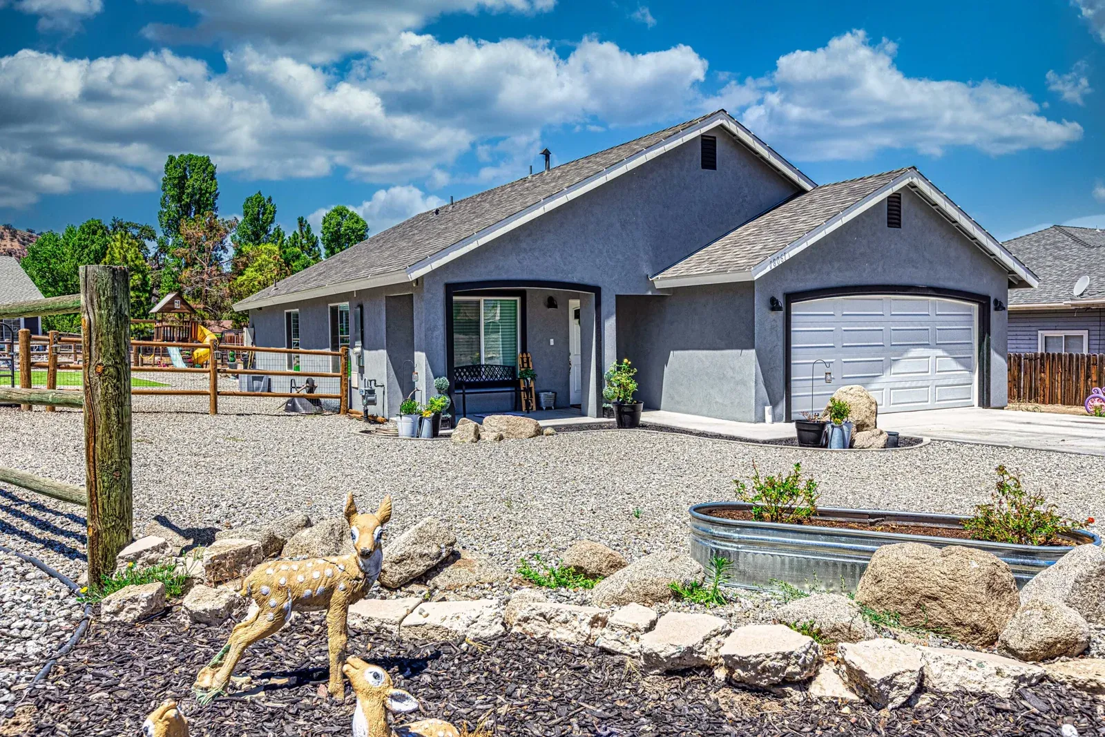 A finished Aspen II home with a landscaped front yard in Tehachapi
