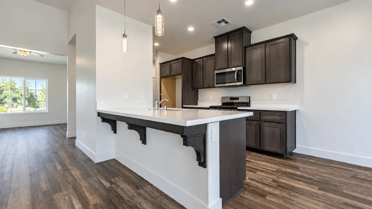 Kitchen with island in the Sunset Retreat model